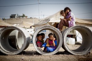 Sept. 3, 2013 - A group of refugee kids sitting on some drain pipes and using them as a playground at Quru Gusik Refugee Camp.....Photo: Flo Smith/NurPhoto (Credit Image: © Flo Smith/NurPhoto/ZUMAPRESS.com)